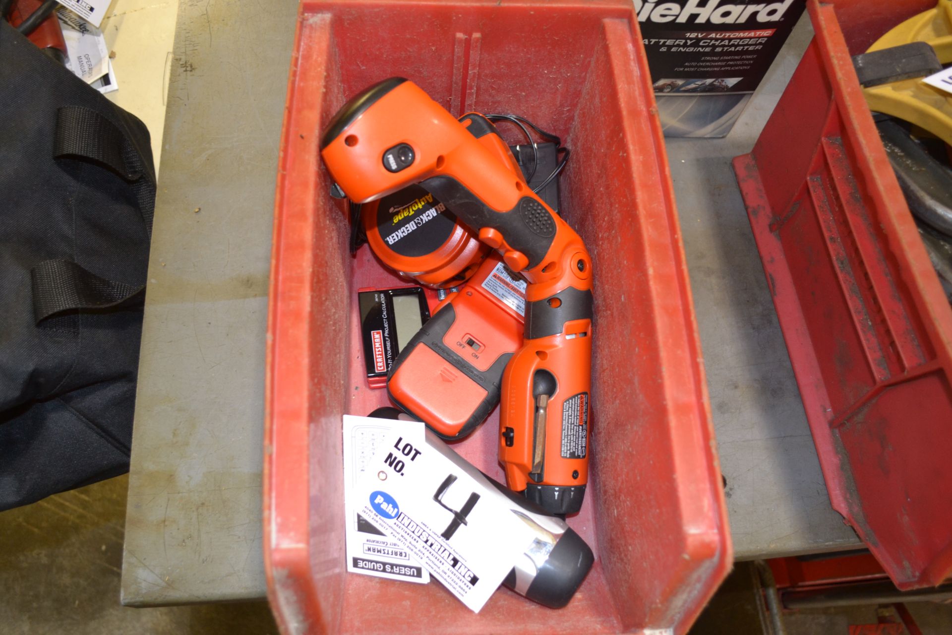 Bin with assorted Black & Decker Tools