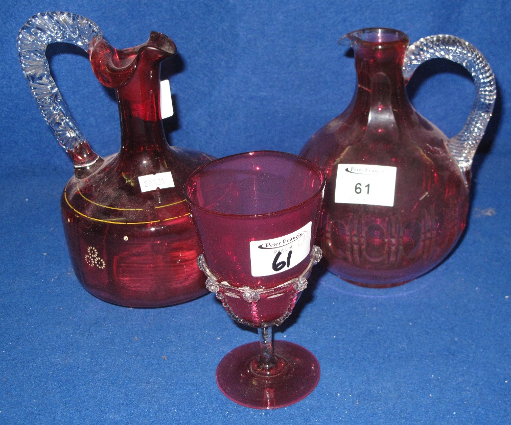 Cranberry glass baluster shaped ewer with thumb and slice cut decoration,