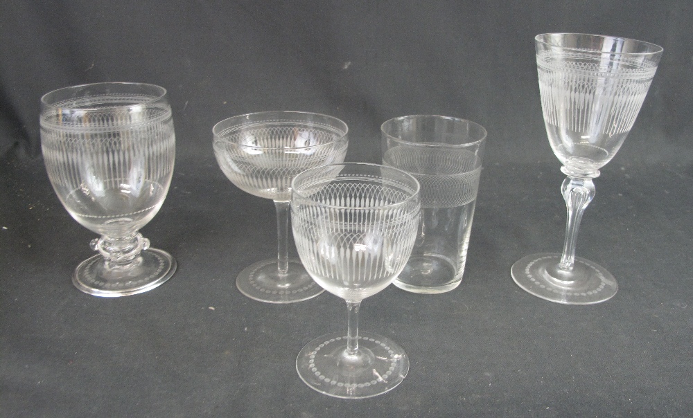 A GROUP OF SIMILAR 19TH CENTURY WHEEL ENGRAVED DRINKING GLASSES of different shapes and forms to