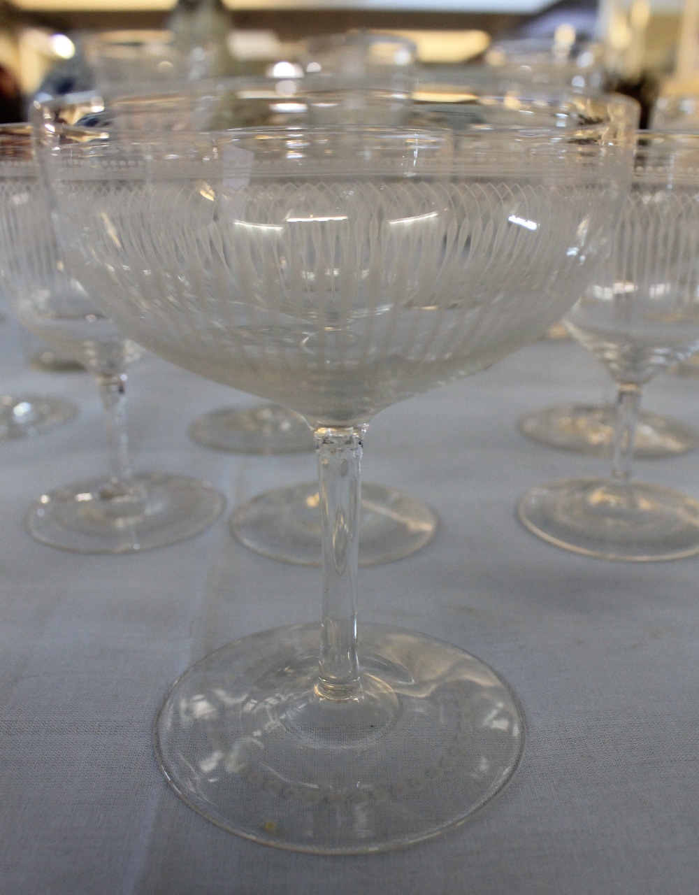 A GROUP OF SIMILAR 19TH CENTURY WHEEL ENGRAVED DRINKING GLASSES of different shapes and forms to - Image 2 of 3