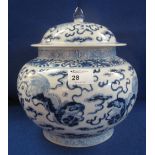 Chinese porcelain blue and white baluster shaped vase and cover overall decorated with Dogs of Fo