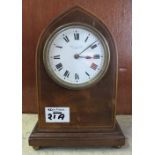 Edwardian inlaid mahogany lancet shaped boudoir clock with enamel face and French brass movement.