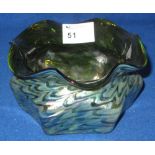 Green iridescent Art glass, baluster shaped, squat vase with flared and waved neck.