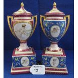 Pair of Vienna type porcelain two handled lidded urns on plinth bases. Painted marks to base.