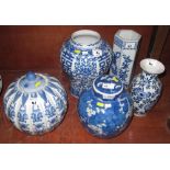 Group of blue and white Oriental vases and jars.