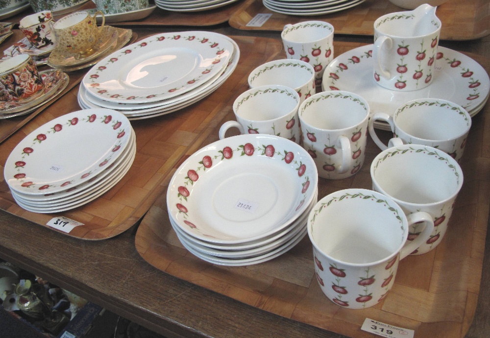 Two trays of Susie Cooper bone china 'Applegay' teaware to include: teacups and saucers;