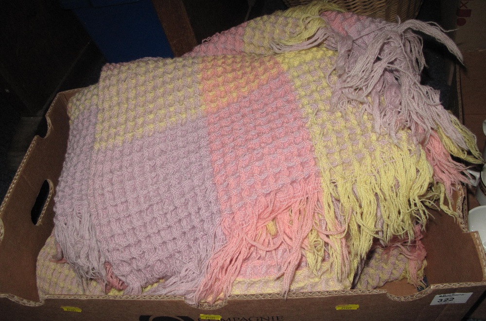 Multi-coloured honeycomb blanket.