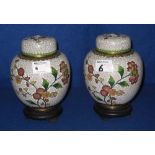 Pair of Chinese cloisonne white ground ginger jars and covers overall with floral decoration,