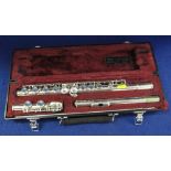 French Bwfet Cooper Scale plated three section flute in lined and fitted plastic case.