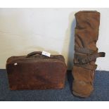 Early 20th Century leather Gladstone bag together with a Second World War camp bed without frame.