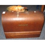 Singer hand sewing machine in Bentwood case.