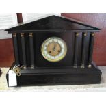 Late 19th Century black slate architectural two train mantel clock.