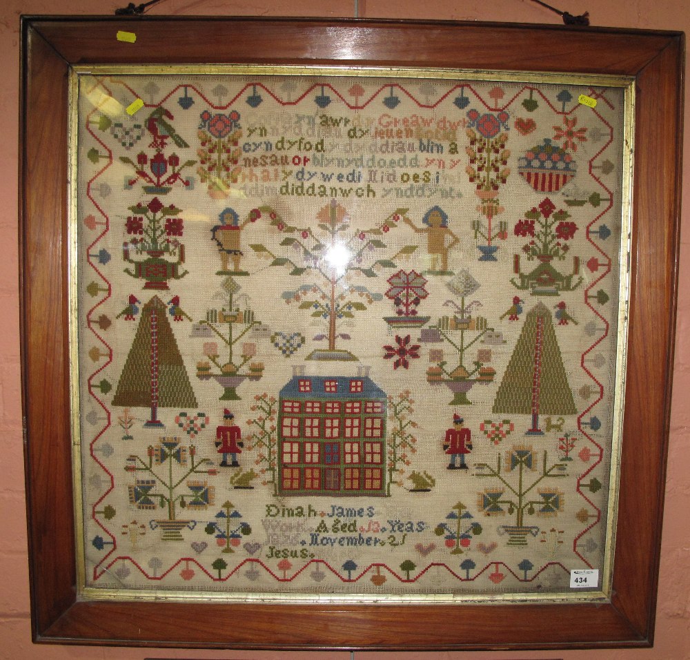 Large framed tapestry sampler with Welsh text by Dinah James, aged 12 years, 1876, within glazed,