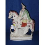 19th Century Staffordshire Pottery flat backed equestrian figure of a mounted Scottish hunter with