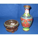 Chinese cloisonne green ground baluster shaped vase with dragon decoration together with a similar