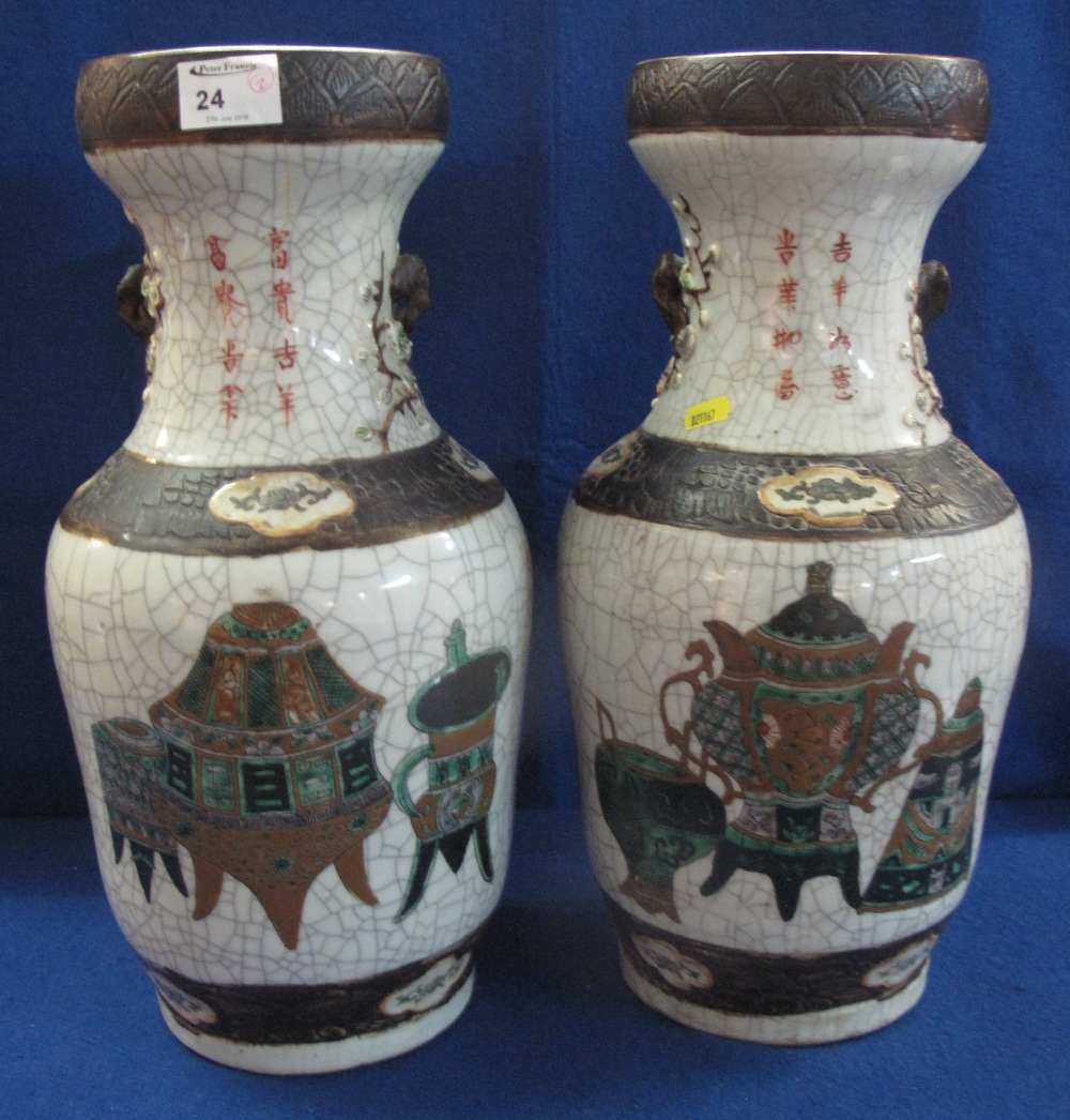 Matched pair of Chinese 19th Century crackle glaze vases decorated with iron brown banding in