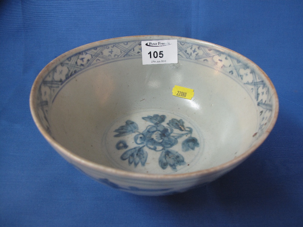 Chinese porcelain bowl in Ming style decorated in underglazed cobalt blue with four floral roundals,