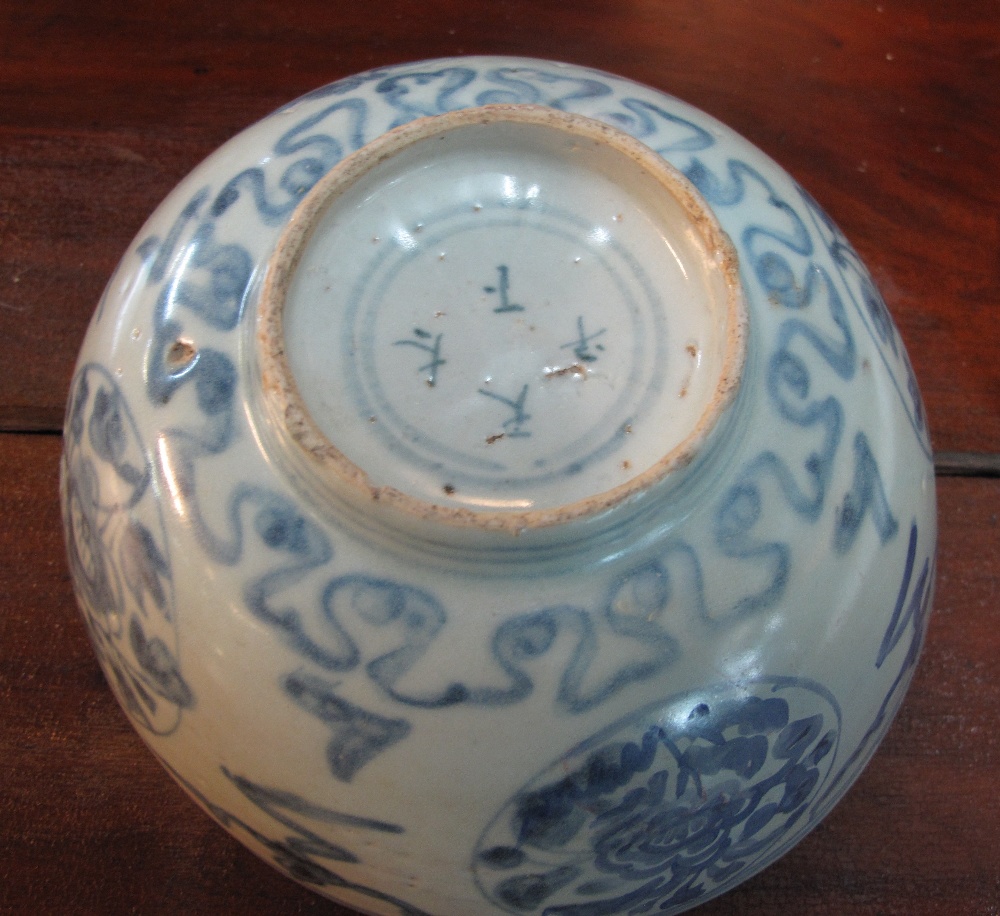Chinese porcelain bowl in Ming style decorated in underglazed cobalt blue with four floral roundals, - Image 5 of 6