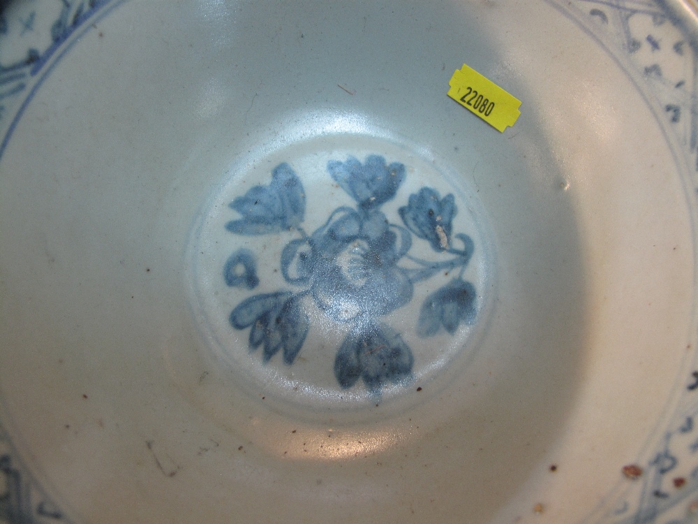 Chinese porcelain bowl in Ming style decorated in underglazed cobalt blue with four floral roundals, - Image 4 of 6