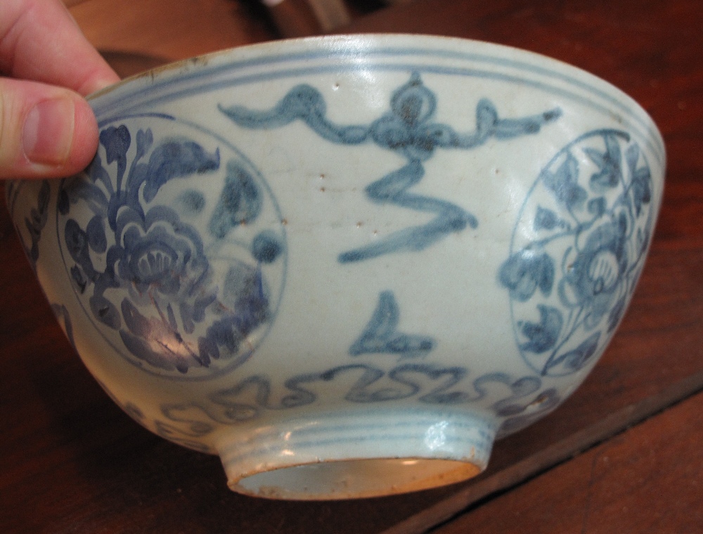 Chinese porcelain bowl in Ming style decorated in underglazed cobalt blue with four floral roundals, - Image 2 of 6
