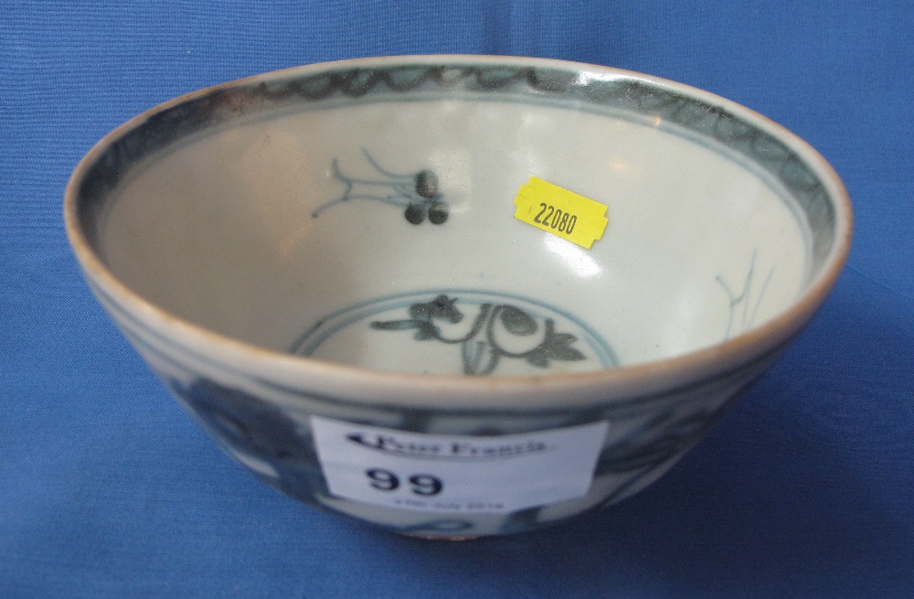 Chinese porcelain Ming style blue and white bowl with dragons in clouds, unmarked to base.