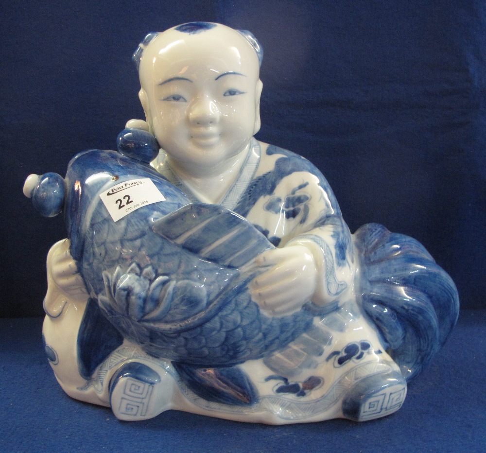 Modern Chinese blue and white study of a figure with fish.