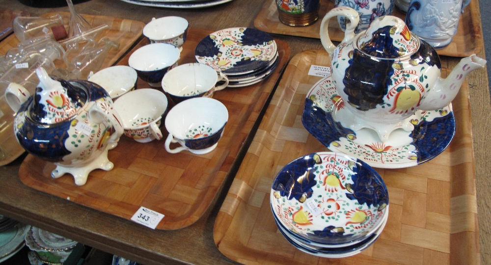 Two tray of 19th Century Gaudy Welsh 'Tulip' design to include: cups and saucers;