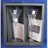 Pair of Waterford crystal 'The Millennium Collection' toasting flute glasses with star cut