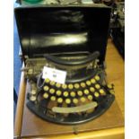 Early 20th Century Imperial model B typewriter in Japanned metal case.