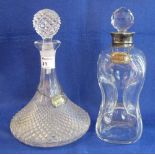 Dimple type glass decanter of waisted form with silver collar and facet stopper together with a