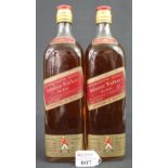 Two bottles of Johnnie Walker Red Label