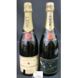 Two bottles of Moet and Chandon Champagn