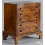 Miniature English mahogany chest of drawers, early 19th c., 17 1/2'' h., 14'' w. Provenance: