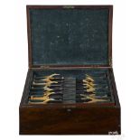 Set of stag handled utensils, 19th c., in a fitted mahogany case with a plaque engraved Capt.