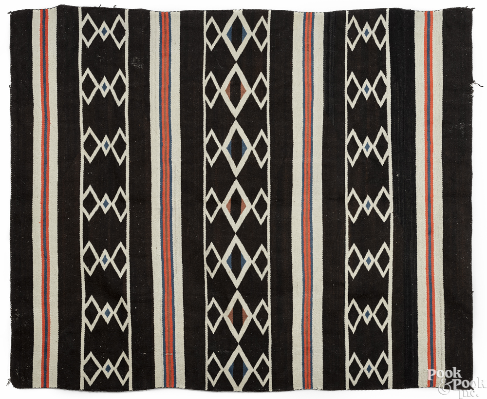 Navajo weaving, early 20th c., 64'' x 53''.