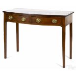 George III mahogany bowfront serving table, late 18th c., 31'' h., 42'' w.
