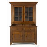 Pennsylvania walnut two-part Dutch cupboard, mid 19th c., 81 1/2'' h., 49'' w. Provenance: Estate of
