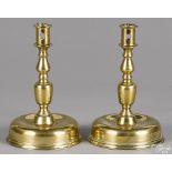 Pair of Dutch brass bell base candlesticks, 17th/18th c., 9'' h.