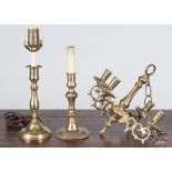 Two brass candlesticks, 18th/19th c., (electrified), 7 1/4'' h. and 8 1/4'' h., together with a