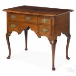Pennsylvania Queen Anne cherry dressing table, ca. 1760, with shell carved knees and stocking