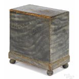 Diminutive New England painted pine chest, early/mid 19th c., retaining its original smoke decorated