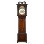 English mahogany tall case clock, ca. 1800, the eight-day works with a rocking ship movement, the