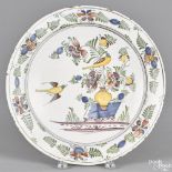 Delft polychrome charger, 18th c., 14'' dia. Provenance: Southeastern Pennsylvania collection.