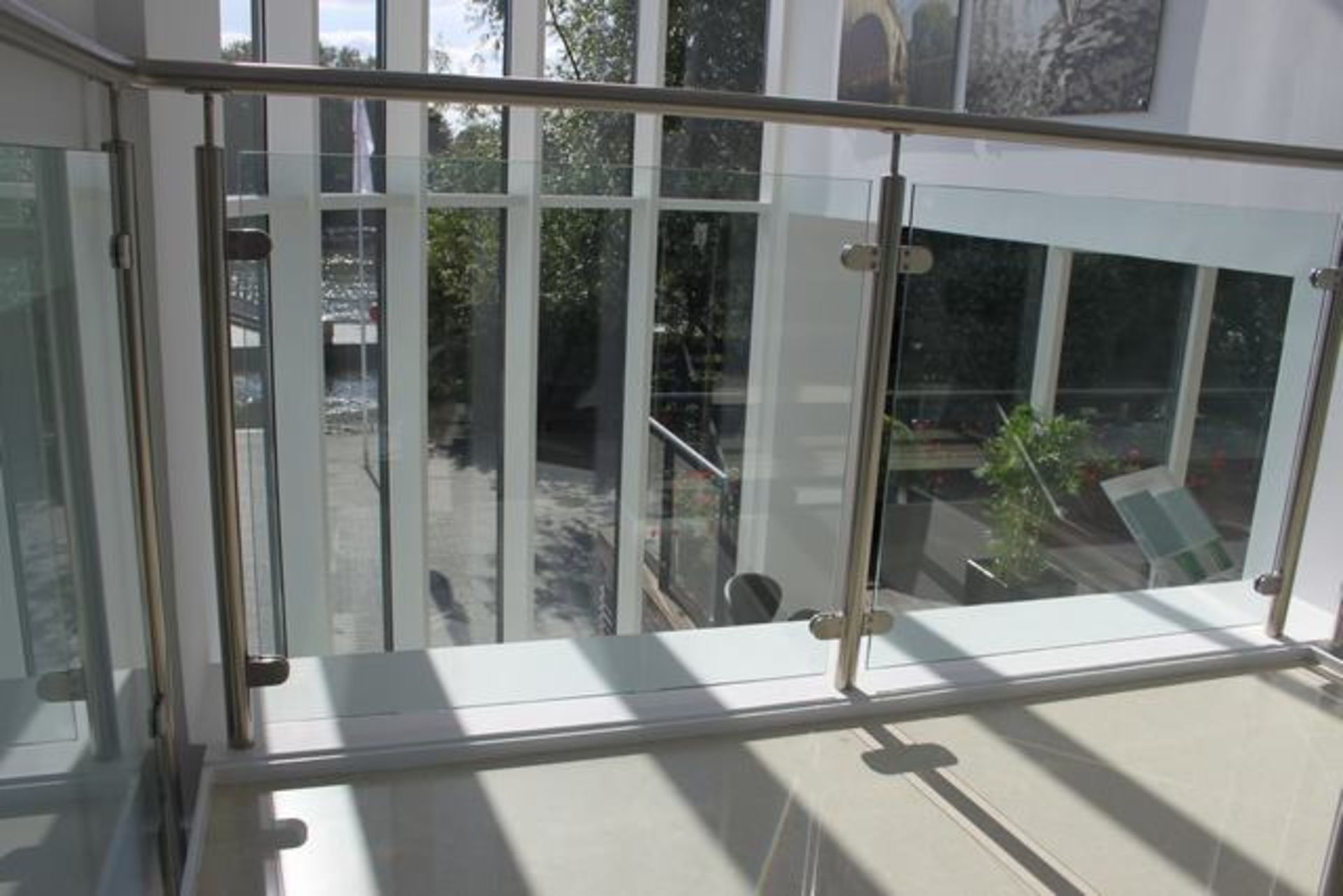 4 x Toughened glass balustrade panels 10mm thick rake angled 960mm x 950mm ( this is glass panels