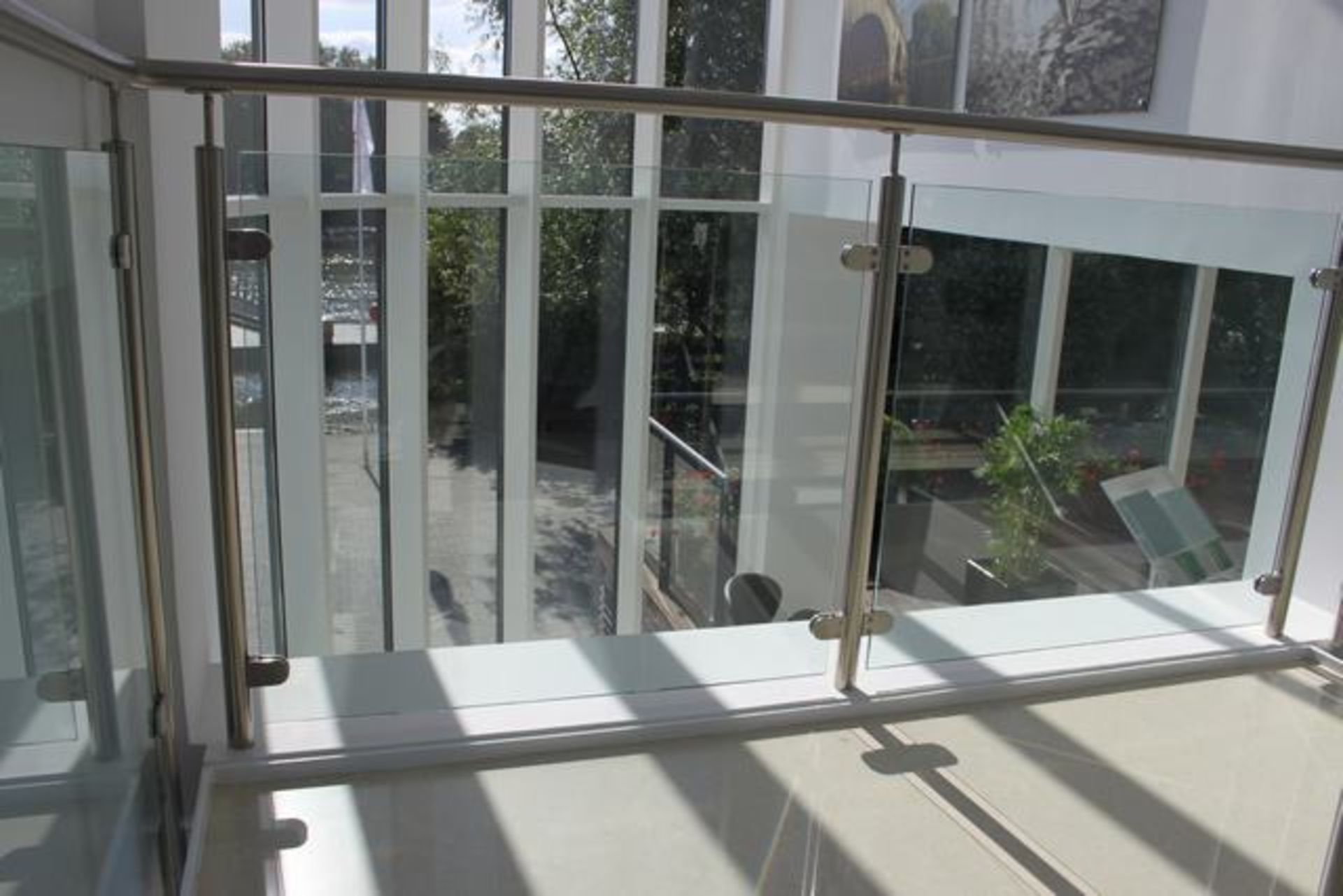 4 x Toughened glass balustrade panels 10mm thick rake 2 x angled 850mm x 700mm and 2 x square