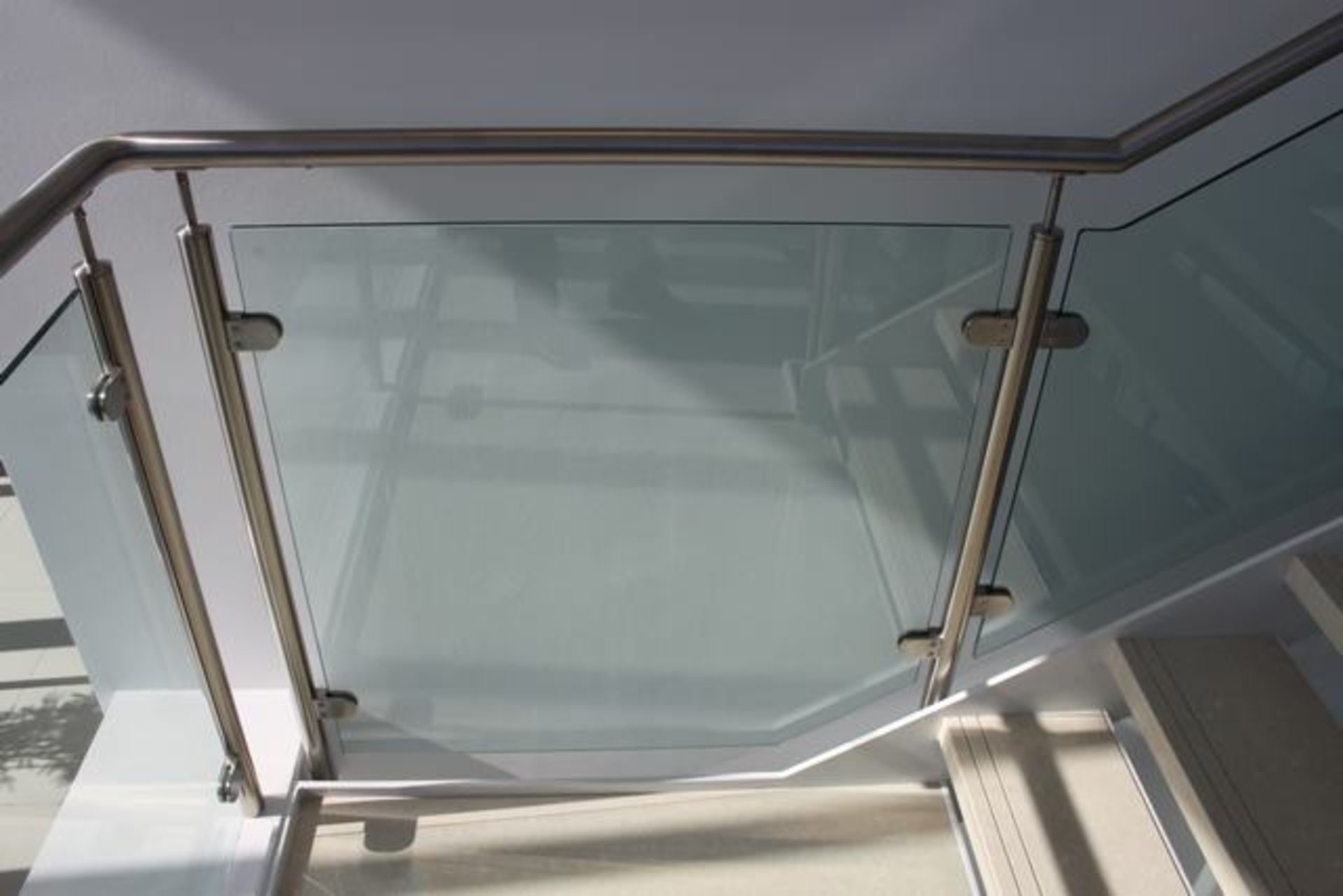 4 x Toughened glass balustrade panels 10mm thick rake angled 900mm x 600mm ( this is glass panels