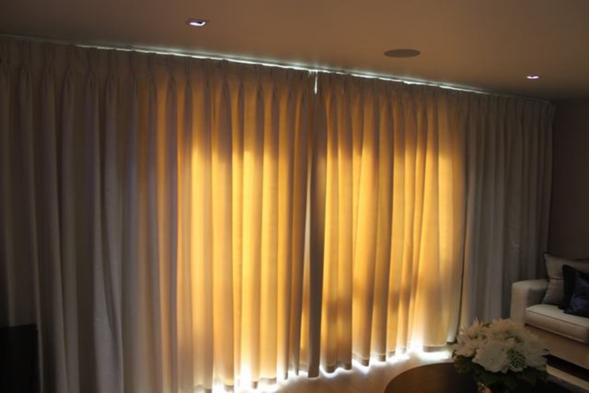 A pair of cream fully lined thermal curtains 5000mm x 2m