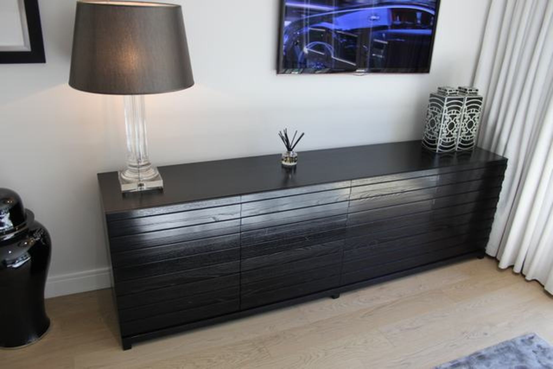 Sideboard credenza four louvered doors beautifully integrated into the piece with dominant