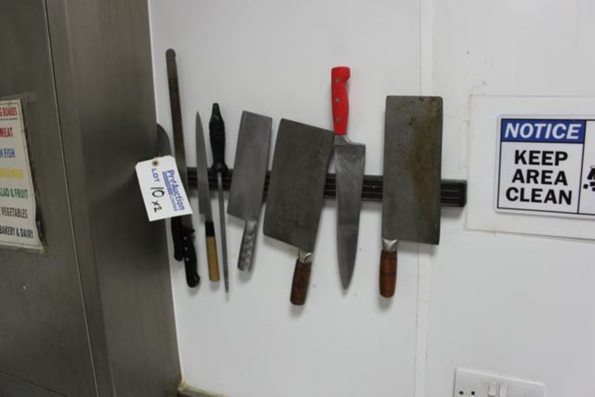 2 x wall mounted professional magnetic knife holders with various knives and sharpeners  Lift out