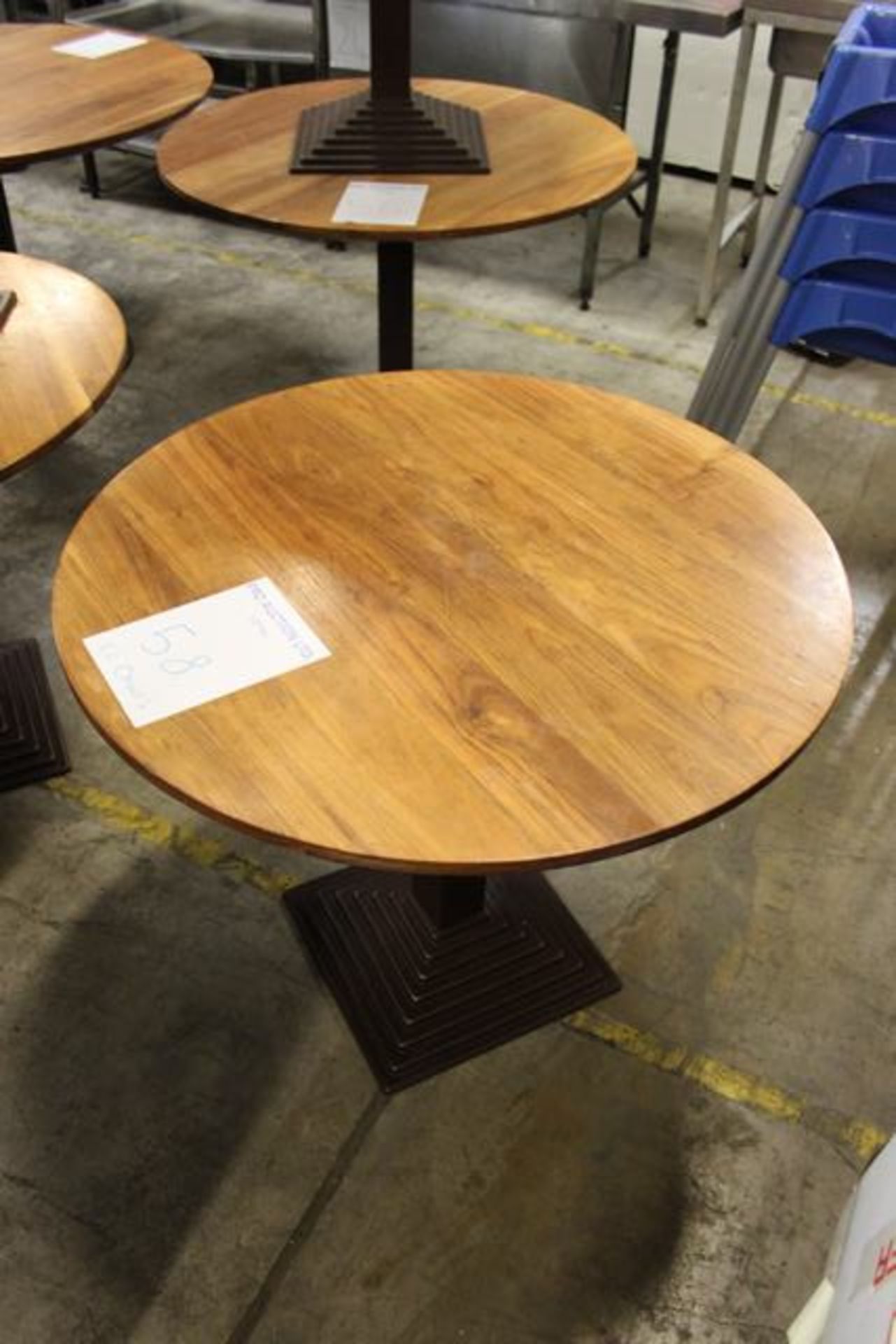 Round dining table 900mm diameter on black cast iron base complete with two dining chairs wooden